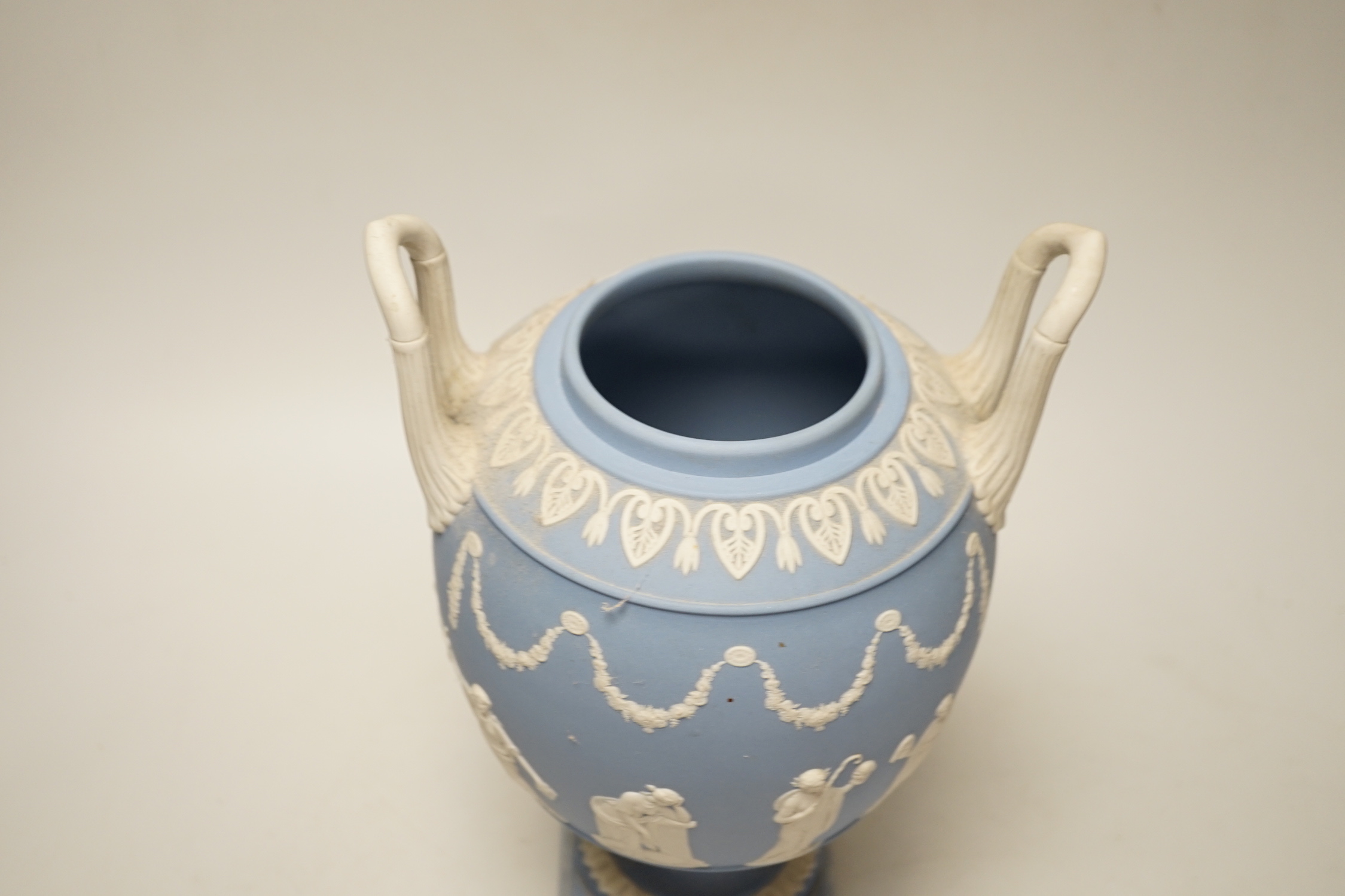A 20th century Wedgwood blue Jasper two-handled urn and cover, 31cm
